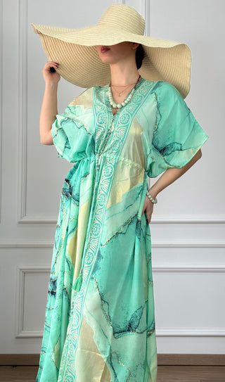Rochie maxi strânsă în talie