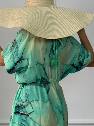 Rochie maxi strânsă în talie