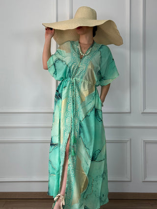 Rochie maxi strânsă în talie